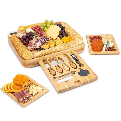 China Sustainable Hot Selling Amazon Extra Large Charcuterie Board Set Customized Design Cheese Board And Bamboo Knife Set for sale