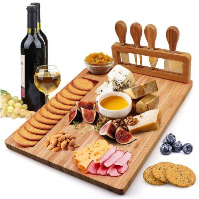 China Sustainable Hot Wooden Serving Tray Amazon Bamboo Cheese Board Set With Cutlery In Slide Out Drawer Cheese Tray Cutting Board Wholesale for sale