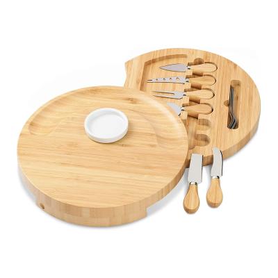 China Viable Housewarming Gift Cheese Board and Knife Set Bamboo Round Charcuterie Boards Meat Platter Personalized Tray with 6 Knives for sale