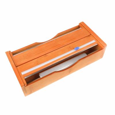 China Sustainable Bamboo Foil Dispenser Plastic Wrap Dispenser with Bamboo Tin Foil Organizer Cutter for Drawer Cabinet for sale