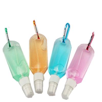 China 30ml 60ml Recyclable Portable Bag Hanging Bottle PETG Hand Sanitizer Waterless Dispenser Alcohol Hand Sanitizer Gel Plastic Bottle for sale