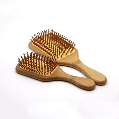 China Nondisposable OEM Paddle Detangling Bamboo Hair Brush for sale