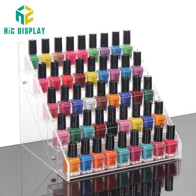 China Custom Cosmetic Clear Acrylic Nail Polish Show Product Display Stand,Free Loading 100pcs Acrylic Perfume Display Stand HIC UV Display Stand for sale