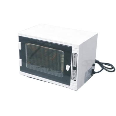 China UV Ozone Barber Shop Beauty Salon Or Disinfection Personal Home Towel Towel Sterilizer Use Heating Cabinet for sale