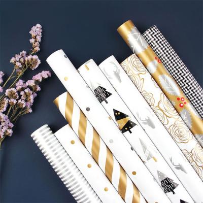 China Logo Gift Customized Printed Eco Friendly Luxury Waterproof Christmas Wrapping Paper for sale