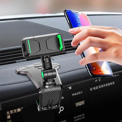 China Multifunctional factory non-slip car holder phone bracket car central control mobile dashboard with license plate navigation bracket for sale