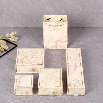 China Custom luxury materials design necklace box cardboard new marble printed paper jewelry box reused with logo printing for sale