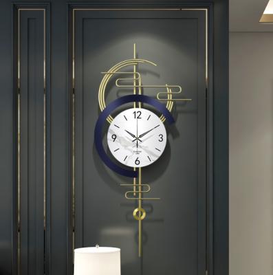 China Light Luxury Luxury Quiet Wall Clock Home Decoration Atmosphere Radio Fashion Wall Hanging Clock for sale