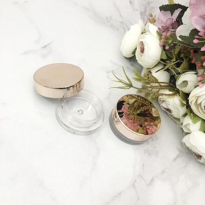 China Wholesale Luxury Cosmetic Jar 5g Round Shiny Cute Plastic Cosmetic Jar Gold Jar Box Cosmetic Packaging for sale