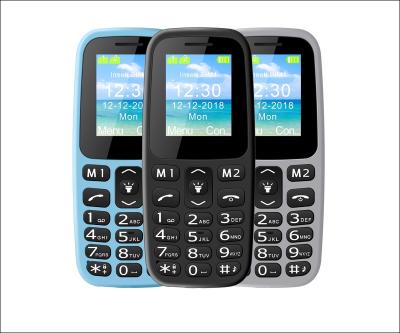 China top 2G phone with SOS main sim with big cradle speaker charging wholesale for sale