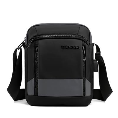 China Men's Casual Bag Business Fashion Waterproof Men's Shoulder USB Function Messenger Bag Briefcase Filling Briefcase for sale