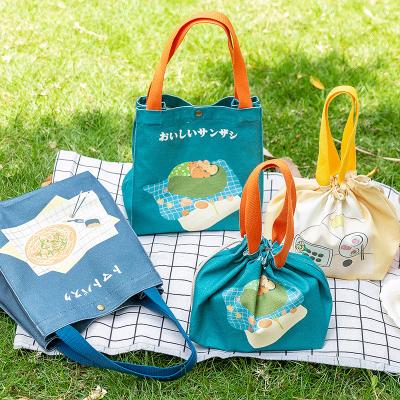 China Waterproof Portable Cartoon Canvas Tote Bento Lunch Box Bag Japanese Outdoor Insulated Picnic Bag for sale