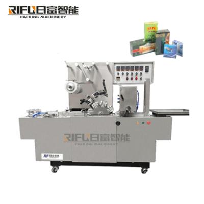 China Automatic transparent food film mask packing machine, cosmetic box, cellophane wrapping machine for sale