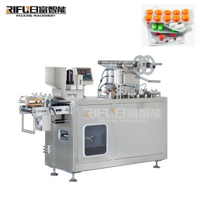 China Automatic Food Skin Care Products Tablet Pill Capsule Blister Packing Machine for sale