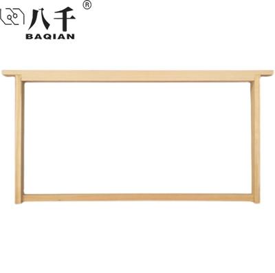 China Honey Flowing Bee Wholesale Wooden Frame National Hive Frame With Copper Hole for sale