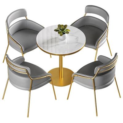 China Cozy small round table in Nordic style modern top round marble dining table coffee table and chair set for sale