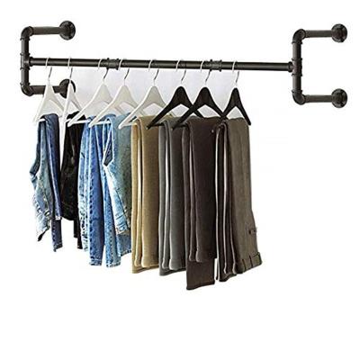 China Traditional industrial style metal wall clothes rack clothing store iron clothes rack clothing props used water pipe display rack for sale