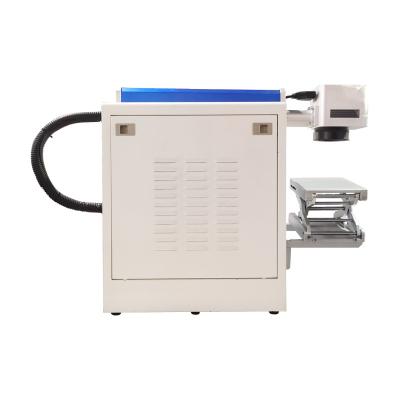 China Full-enclosed promotion price mini desktop 10W factory fiber laser metal marking machine for metal crafts engraving for sale