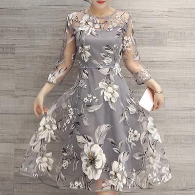 China fashion & charming round neck 3/4 sleeve floral print see-trough women's dress à venda