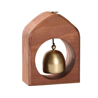 China Creative Minimalist Brass Decoration Suction Refrigerator With Door With Wood Rings Housewarming Wind Chimes for sale