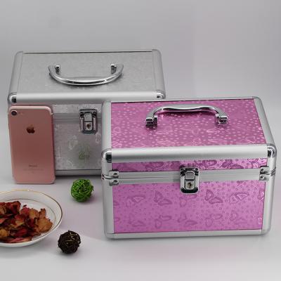 China Waterproof Shockproof Dustproof Aluminum Cosmetic Case With Foam Make Up Trolley Case With Legs for sale