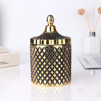 China Custom Creative Luxury European Style Eco-friendly 500ml Gold Lid Glass Candle Holders Candle Jars for sale