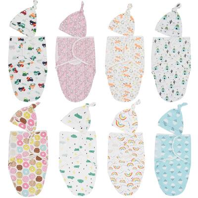 China Folded Blanket for Baby with Adjustable Wrap Cotton Wrap Organic Cotton Printed Muslin Wrap Covering Hat Set for sale