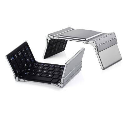 China Comfortable Wireless Mobile BT Tri Folding Ergonomic Portable Mini Wireless Keyboard For Travel for sale