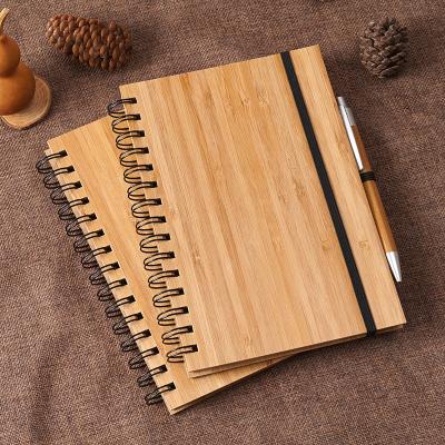 China Wholesale A5 A6 A4 B5 Eco-Friendly Spiral Bamboo Wooden Cover Journal Custom Notebook Planner with Elastic Band Pen for sale