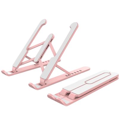 China Plastic Adjustable Foldable Laptop Stand (Height) Adjustable Portable Adjustable Computer Supporter for sale