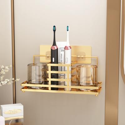 China Sustainable Self Adhesive Portable Metal Toothbrush Holder Wall Mounted Gold for sale