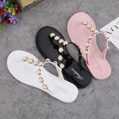 China SHOCK ABSORBING Pearl Jelly Slippers 2022 Fashion Ladies PVC Flip Flops Shoes Late Summer Women Flip Flop Beach Sandals For Girl for sale