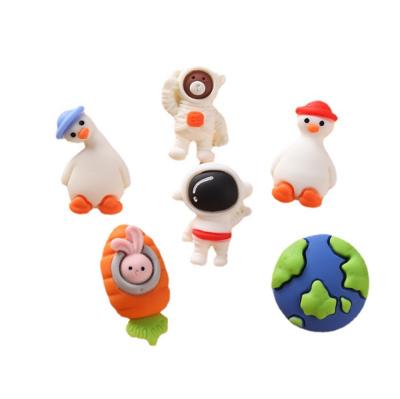 China China Wholesale Creative Spot Cartoon Personality Chicken Earth Astronaut Modeling Resin Lapel Soft Rubber Material Pin for sale