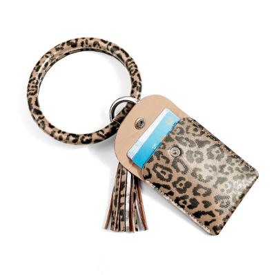 China Bags 6 Styles PU Key Chain Tassel Keychain Disc Bracelet Leopard Leather Pendant Leather Bracelet Custom Snake Keychain for sale