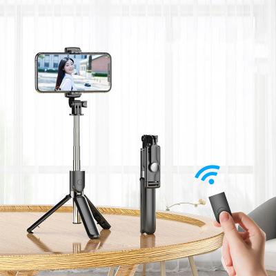 China Portable Selfie Stick 360 Rotation Smart Blue Tripod Tooth Wireless Selfie Stick for sale