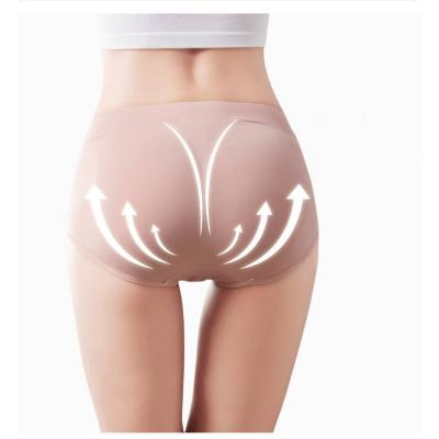 China Seamless Women's Breathable Butt Lifter Popular Honeycomb Abdomen And Hip Lifting Panties Pure Cotton Girls Hip Lift Panties for sale