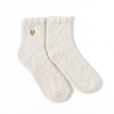 China New Winter Antibacterial Fuzzy Socks Custom Embroidered Logo Warm Fluffy Pink Socks Women for sale