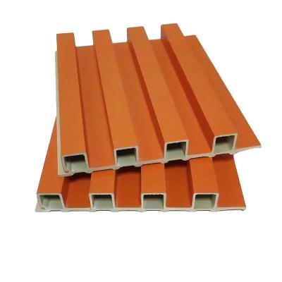 China Modern Indoor Wall Decoration 160*25Pure Wood Composite Materials Grill Orange Pvc Wall Panel for sale