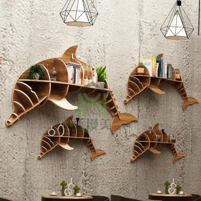 China Nordic modern creative dolphin shelf wall decoration living room background wall decoration animal modeling pendant for sale