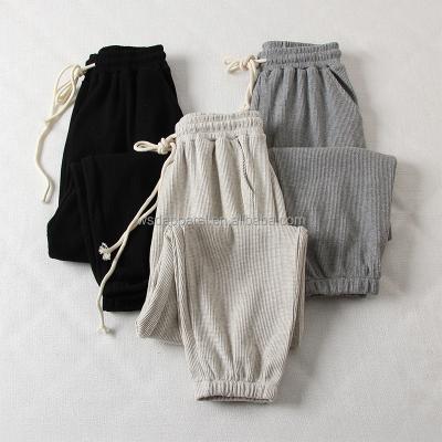 China Anti-wrinkle 2021 new autumn sports casual pants waffle high waist thin sports tracksuits for sale