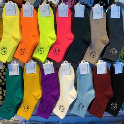 China Korean style sports fashion Smiley Sports Cotton Socks Autumn bumps new women's sports socks and winter couples for sale