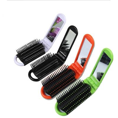 China Handy Foldable Travel Pocket Hair Brush With Mirror Folding Rectangle Premium Mini Hair Brush For Woman Custom Premium Pop Up Brush for sale