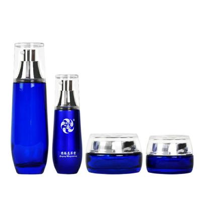 China Wholesale Custom Clear Blue Personal Care Cosmetic Bottle Set 40ml 100ml Skin Care Packaging Container Jar 25g 40g for sale