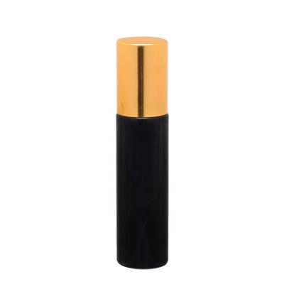 China Personal Care Round Oil 10ml Black Glass Perfume Roll On Bottle With Gold Color Cap for sale