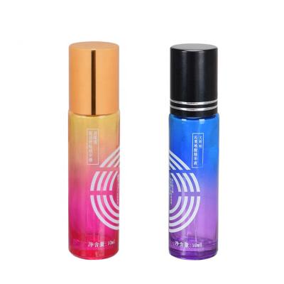 China Personal Care Empty Round Painted Colored Glass Oil 10ml Perfume Roll On Bottle With Gold Color Cap for sale