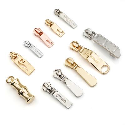 China Nickel Free Custom Zipper Puller, Garment Metal Zipper Puller Slider Brand Logo, Bag Zipper Puller Main Zipper Pull Metal Zipper Puller Custom Logo for sale