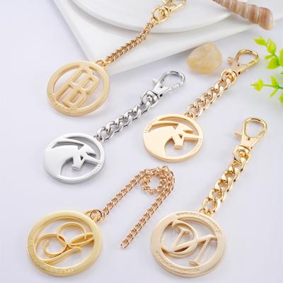 China The Hanging Brand Logo Tag Gold Custom Metal Name Tag Eco-friendly Metal Bag Accessories Luxury Metal Tag For Handbags With Hook Chain for sale