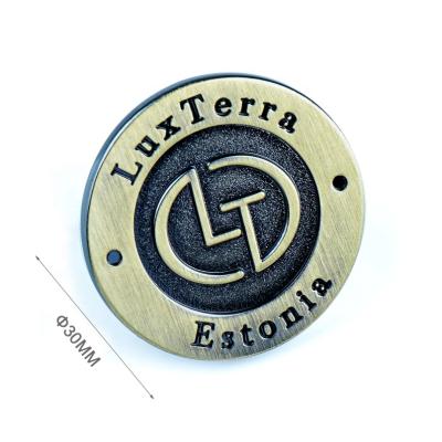 China Eco - Friendly Bag Accessories Metal Plates Customized Logo , Brushed Antique Brass Round Embossed Metal Labels For Handbags for sale