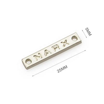 China Sustainable Custom Metal Clothing Labels With 2 Holes , Design Nickel Metal Sewing Label For Clothing for sale