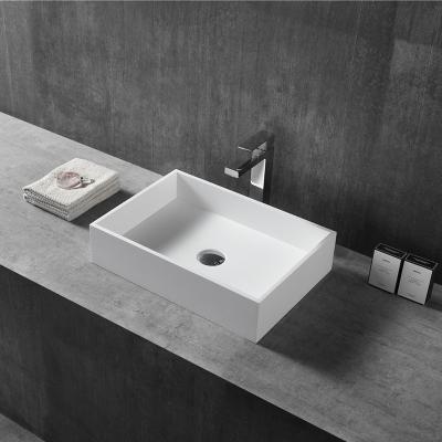 China Soft & smooth Wholesale bathroom solid surface pedestal sink black resin stone composite freestanding washbasin hand washing basin for sale